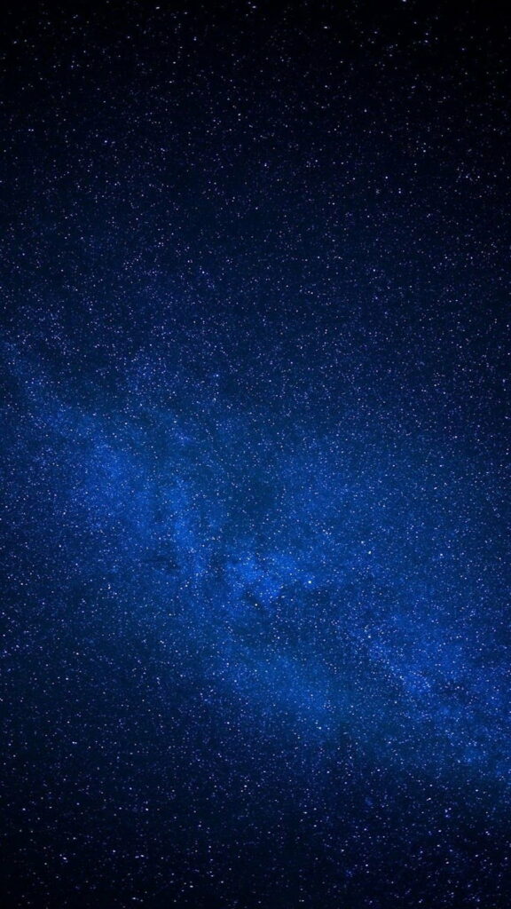 Starry Seascapes: A Captivating Phone Wallpaper in a Deep Blue Universe