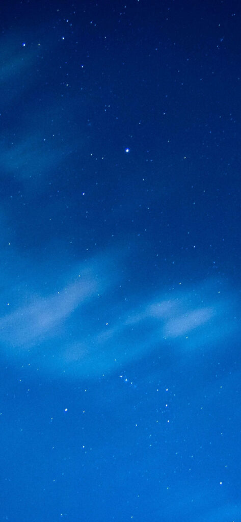 Starry Night: A Mesmerizing Blue Iphone Background Wallpaper