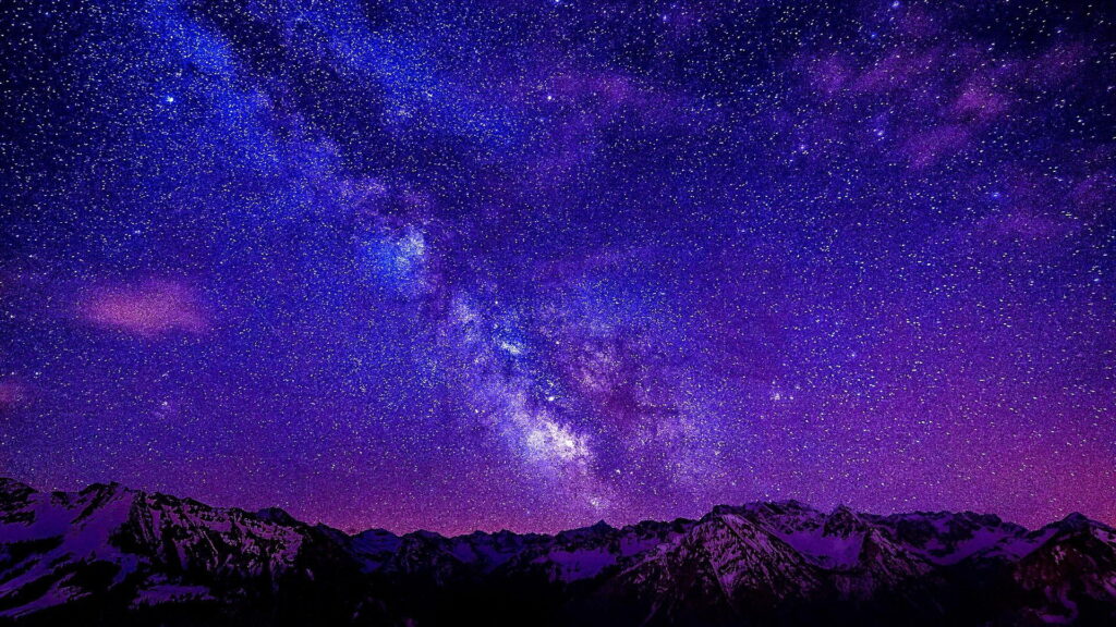 Starry Night Sky in Stunning HD: A Purple Galaxy and Eerie Atmosphere Wallpaper