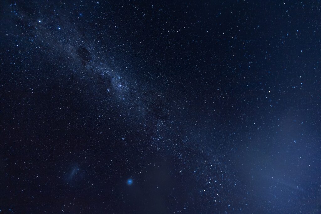 Mesmerizing Starry Sky Wallpaper with Stunning Cosmic Nebula Background