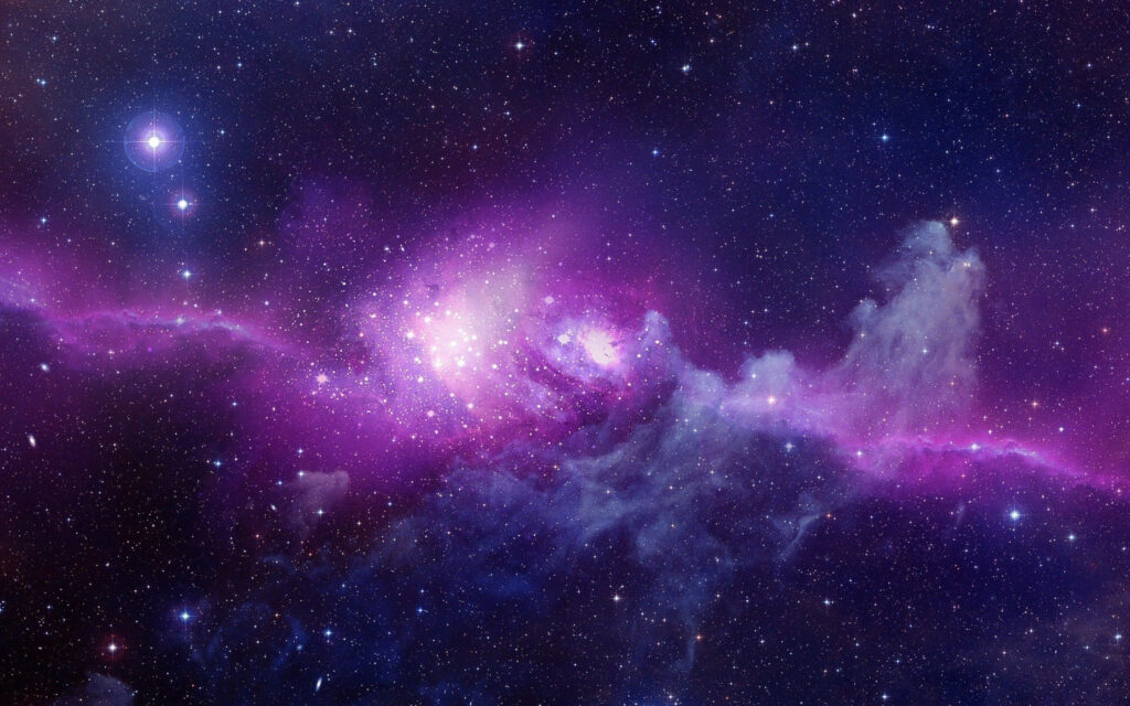 Stellar Splendor: Mesmerizing Image of the Enigmatic Twisted Galaxy Illuminated by Countless Dazzling Stars Wallpaper