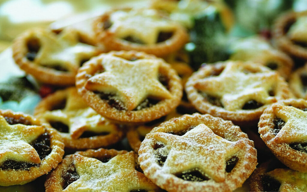 Whimsical Cookies dusted with Icing Sugar - An Eye-catching Visual Treat Wallpaper
