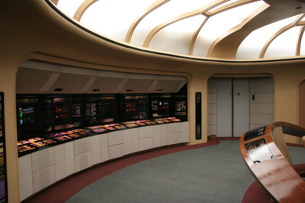 Starship Enterprise-D Bridge Wallpaper: Futuristic Design Background