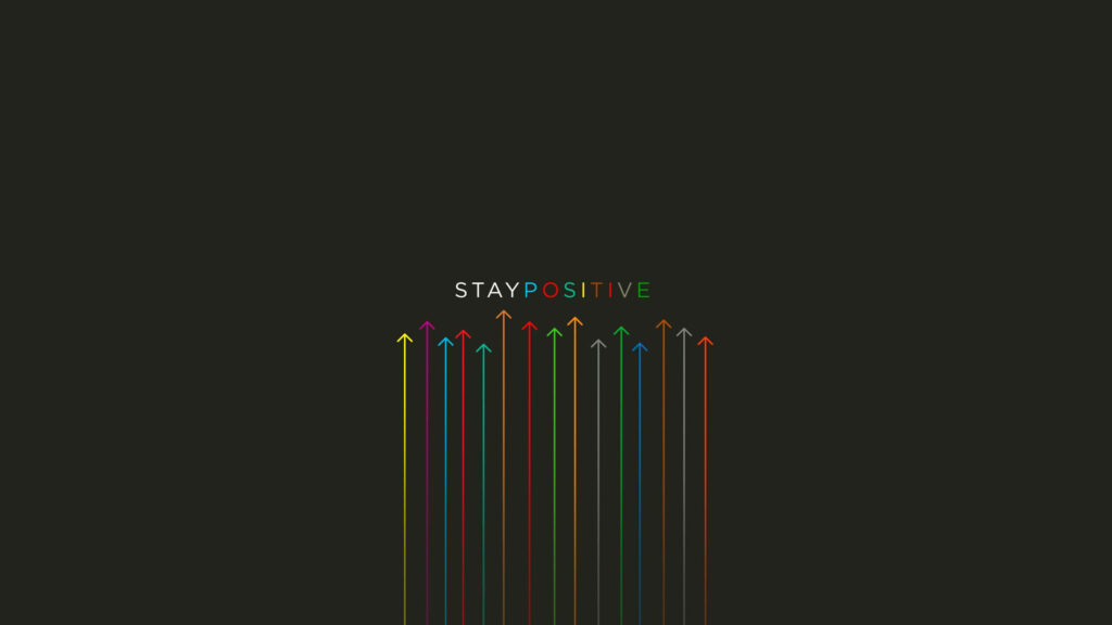 Stay Positive Wallpaper: Uplifting Arrows on Dark Background
