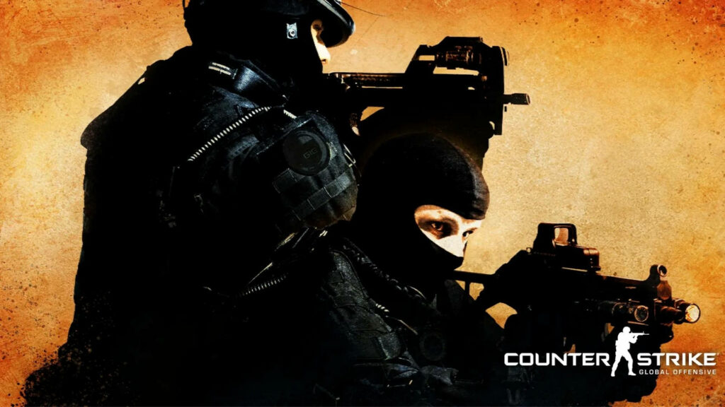 Stealthy Duo Surrounded by Desert Sands – CS:GO Characters on a Covert Mission Wallpaper