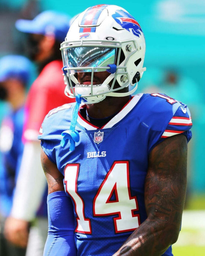 Stefon Diggs Buffalo Bills action shot with blue red uniform futuristic visor high resolution wallpaper
