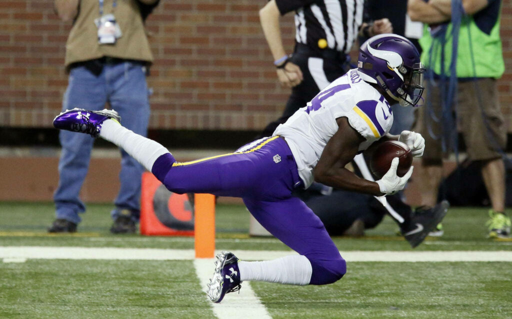 Stefon Diggs Dynamic Football Action Wallpaper Background