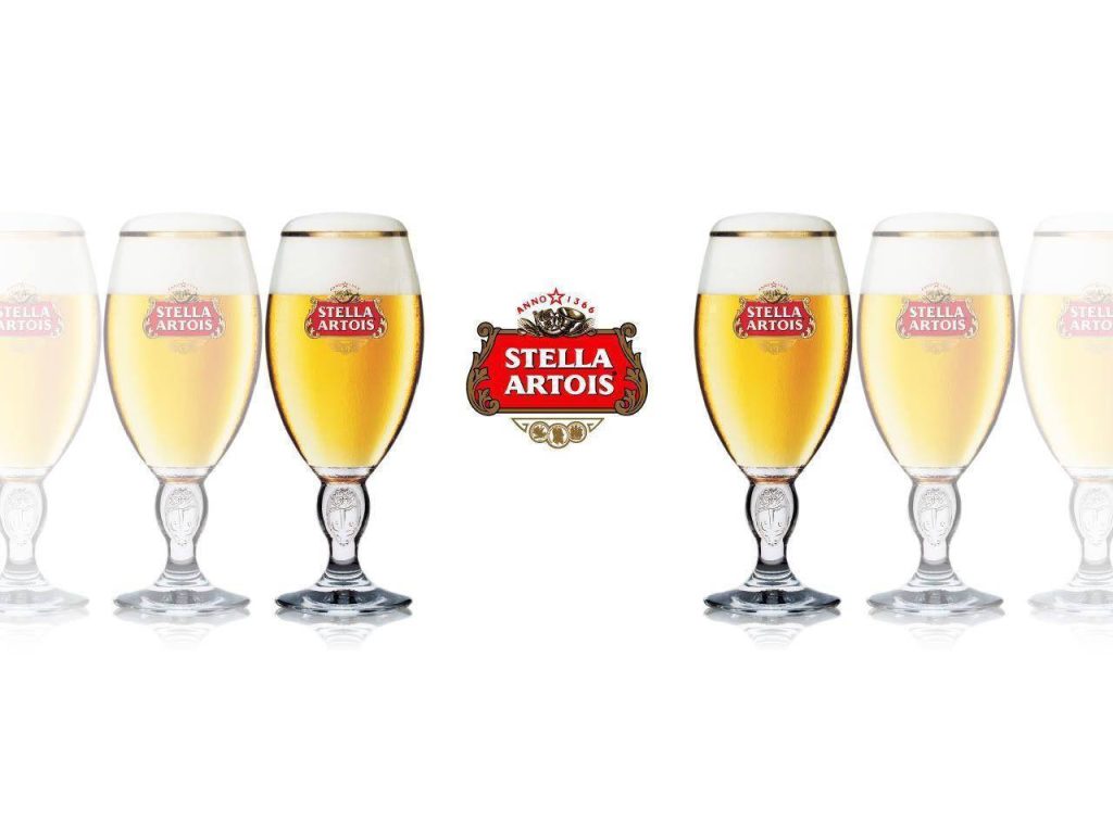 Stella Artois wallpaper with golden beer chalices and red white logo on clean white background