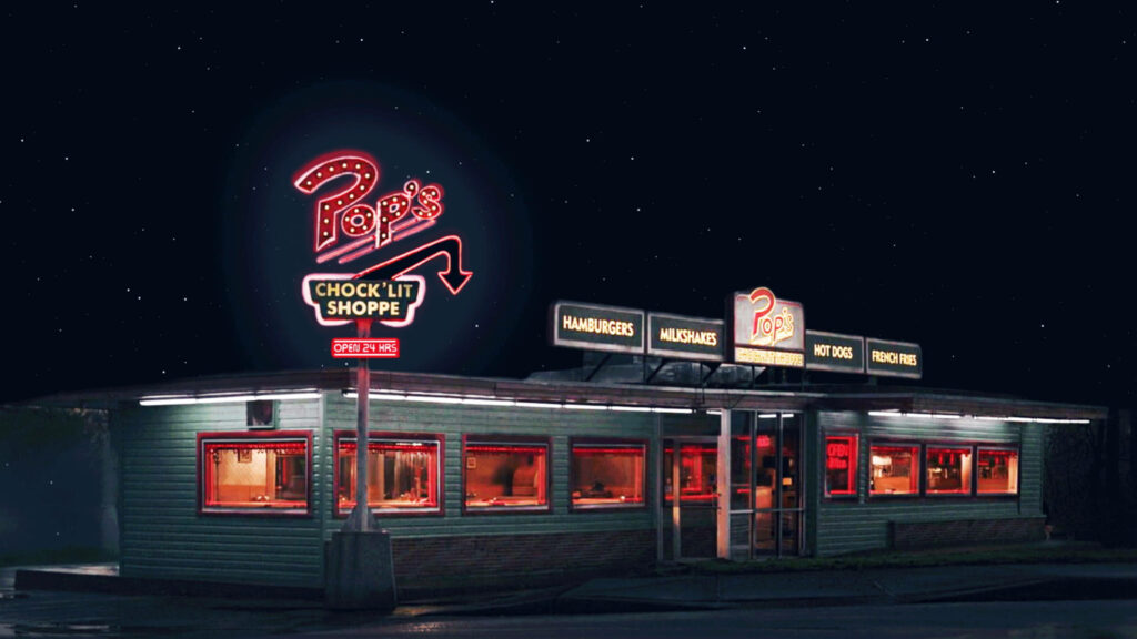 Step into the Retro Charm of Pop's Chock'lit Shoppe - A Riverdale Wallpaper to Transport You Back in Time!
