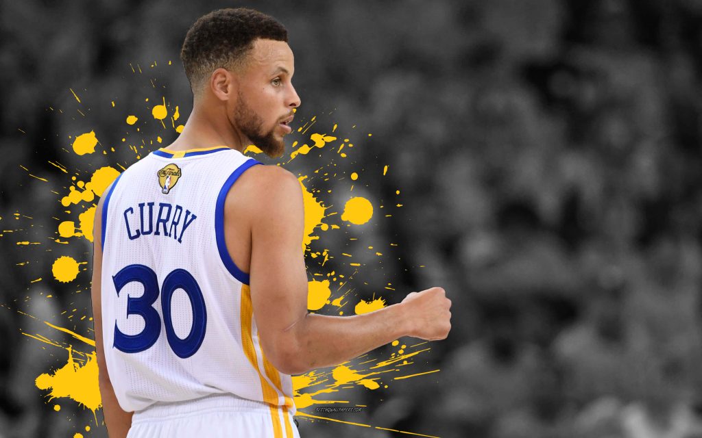 Stephen Curry in Golden State Warriors jersey with yellow paint splatters and blurred crowd background Wallpaper