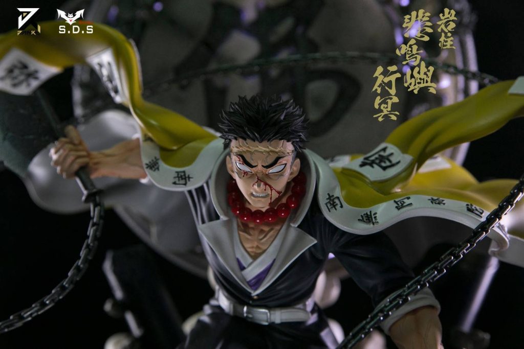 Stone Hashira Gyomei Himejima anime figure with spiked flail yellow haori Demon Slayer wallpaper