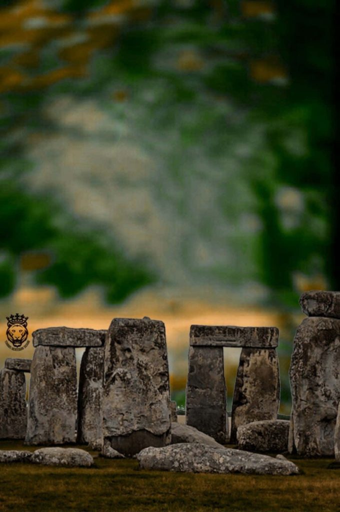 Stonehenge monument with weathered stones and green blurred background for photo edits Wallpaper