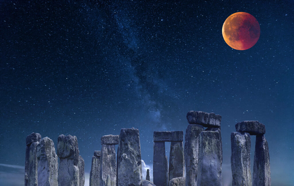 Stunning Stonehenge Wallpaper: Milky Way & Red Moon Night Sky