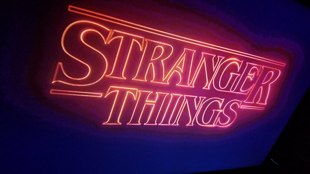 The Enigmatic Demigorman of Stranger Things: A Mysterious Logo in the Dark Wallpaper