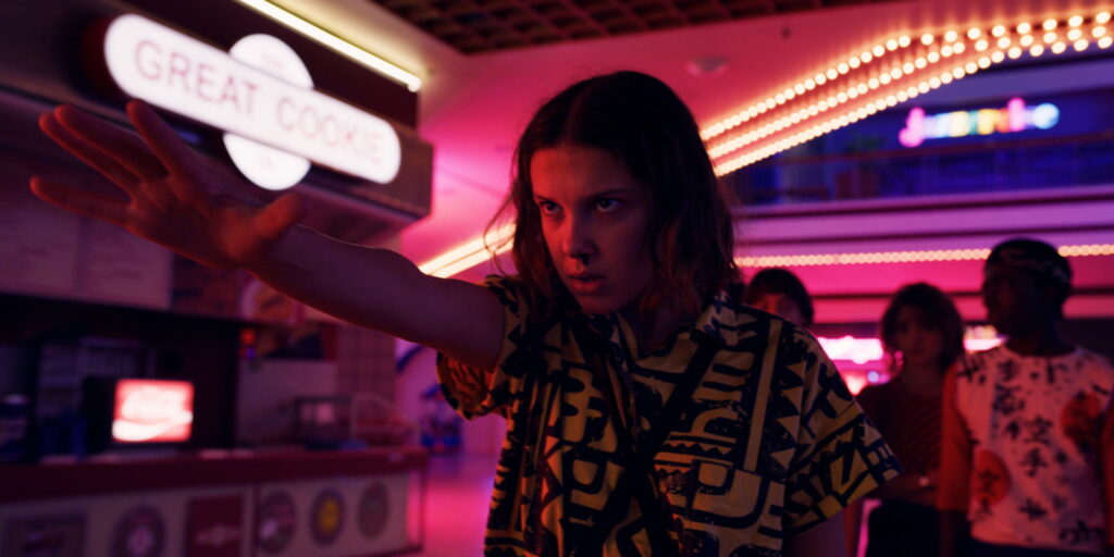 The Enigmatic Eleven: Millie Bobby Brown Steals the Spotlight in this HD Wallpaper from the Acclaimed TV Show, Stranger Things