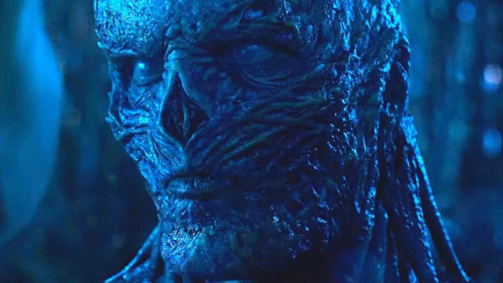 Close-up of Vecna from Stranger Things with eerie blue tones for dark horror wallpaper background
