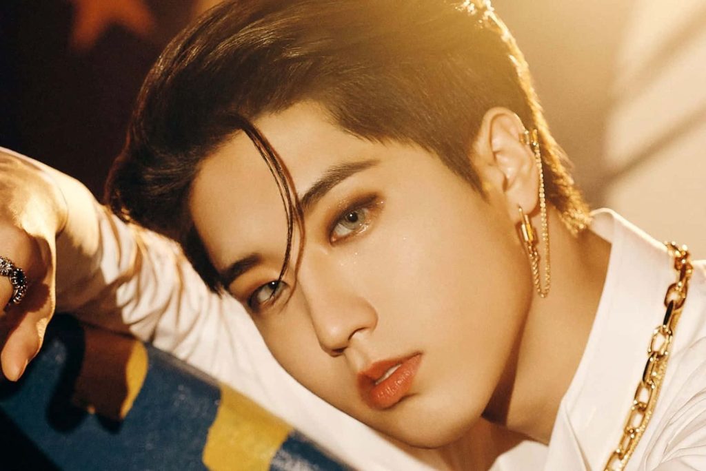 Stray Kids Han Ji-sung portrait warm golden light white shirt dangling earring K-pop wallpaper