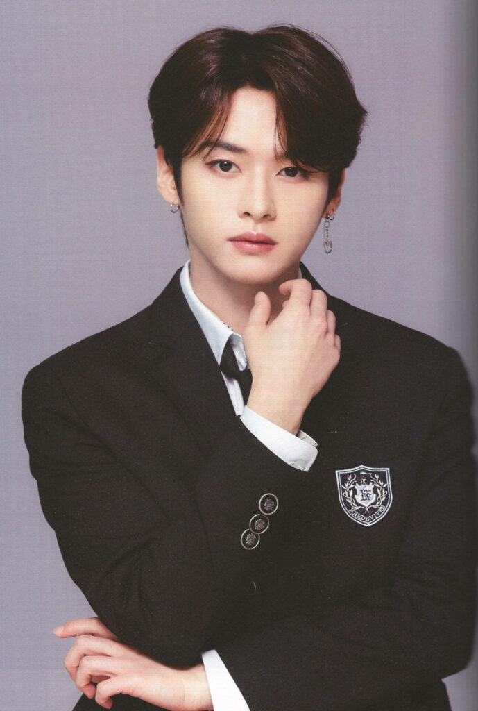 Stray Kids Minho in sharp school uniform with polished sophisticated look wallpaper background