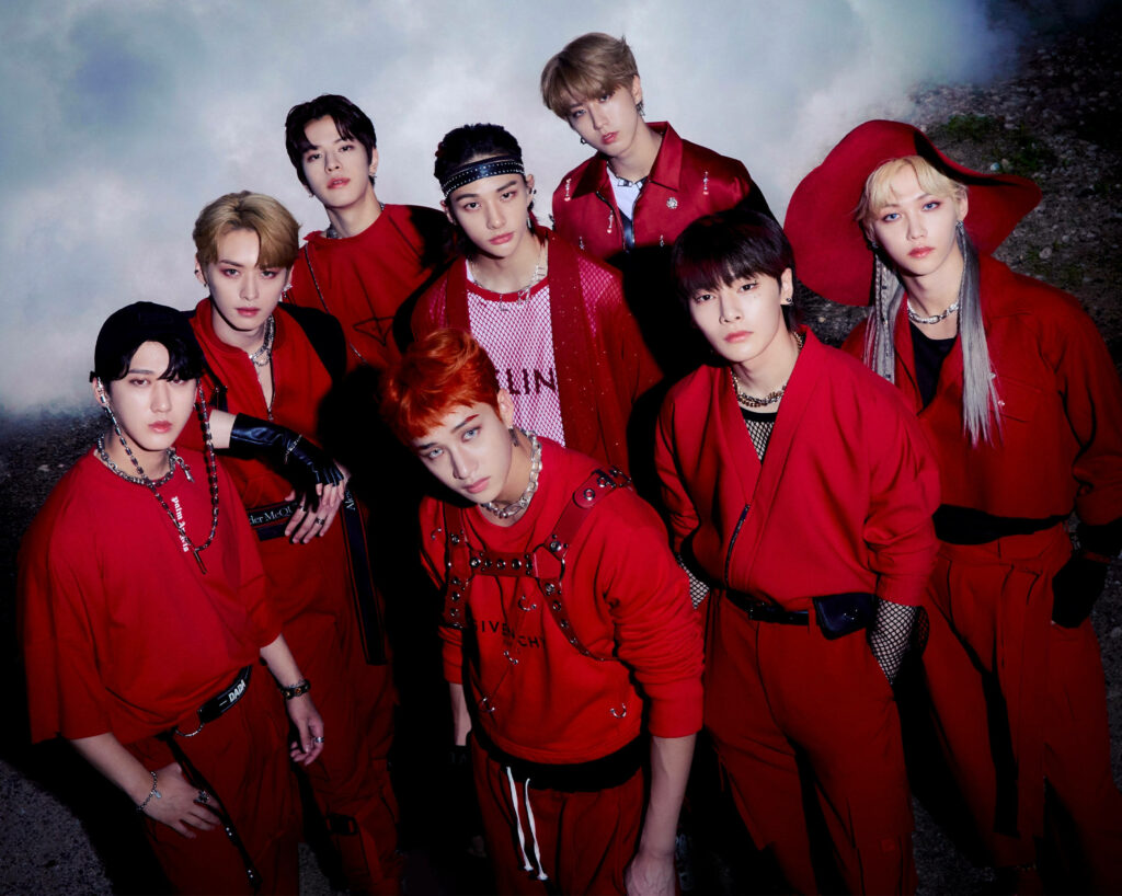 Stray Kids No Easy wallpaper with band in bold red outfits smoky background powerful group