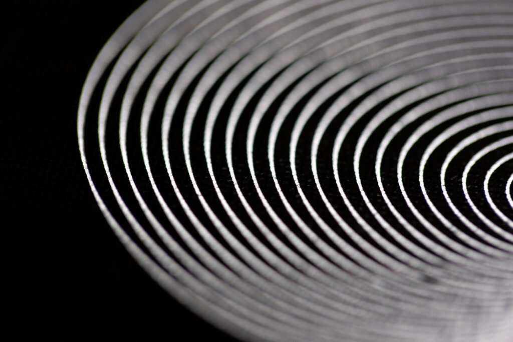 High-Res Abstract Wallpaper: Striking White Rings on Black Background