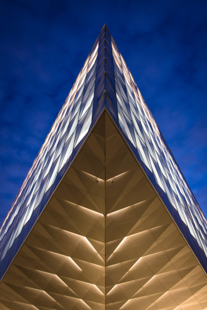 Striking Architectural Facade Wallpaper with Geometric Patterns