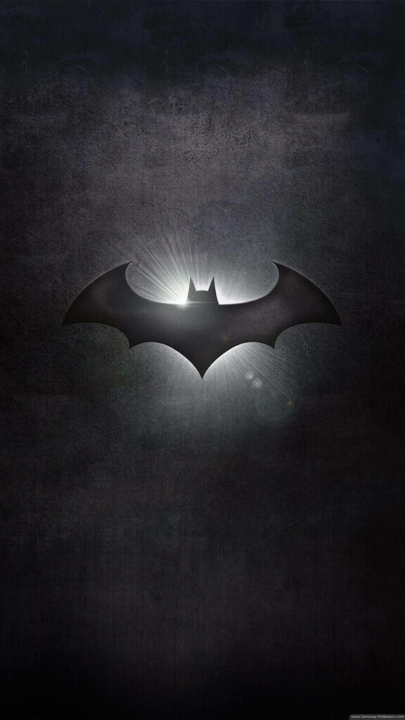 Backlit Batman logo wallpaper glowing against dark textured background for iPhone screens