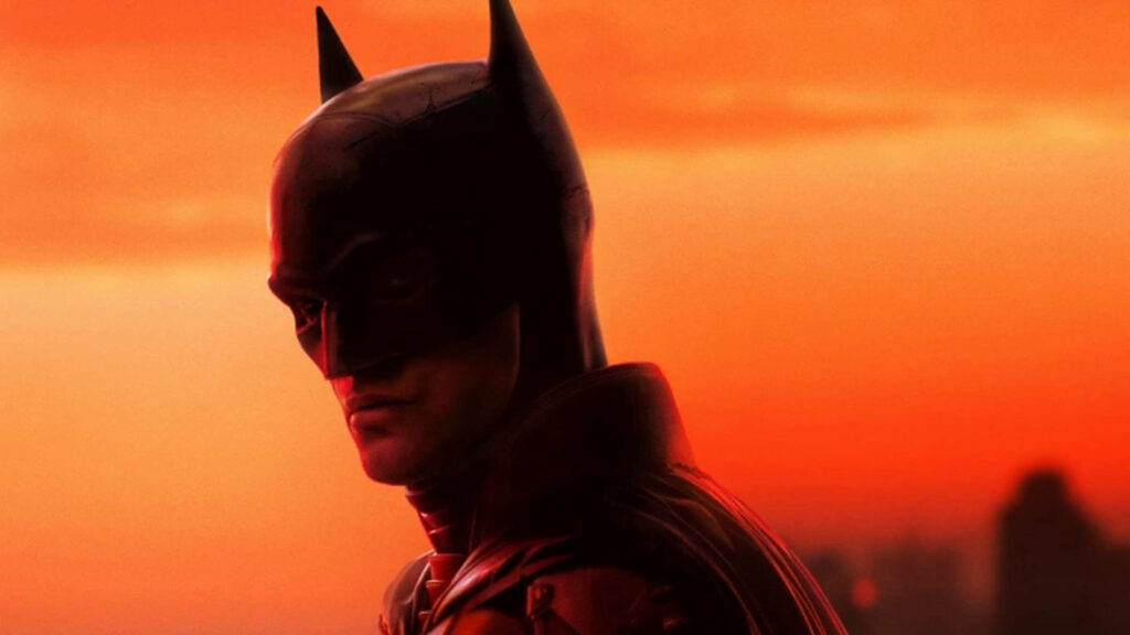 Striking Batman Wallpaper: Iconic Silhouette Against Vibrant Sunset