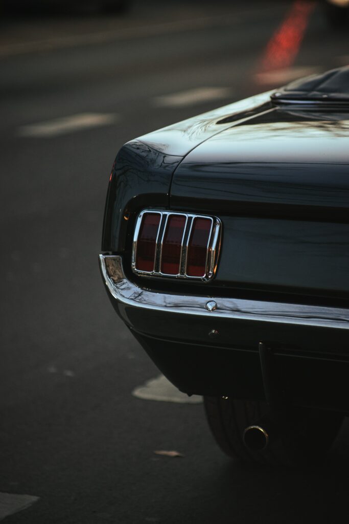 Striking Black Ford Mustang Tail Light Wallpaper - Classic Design