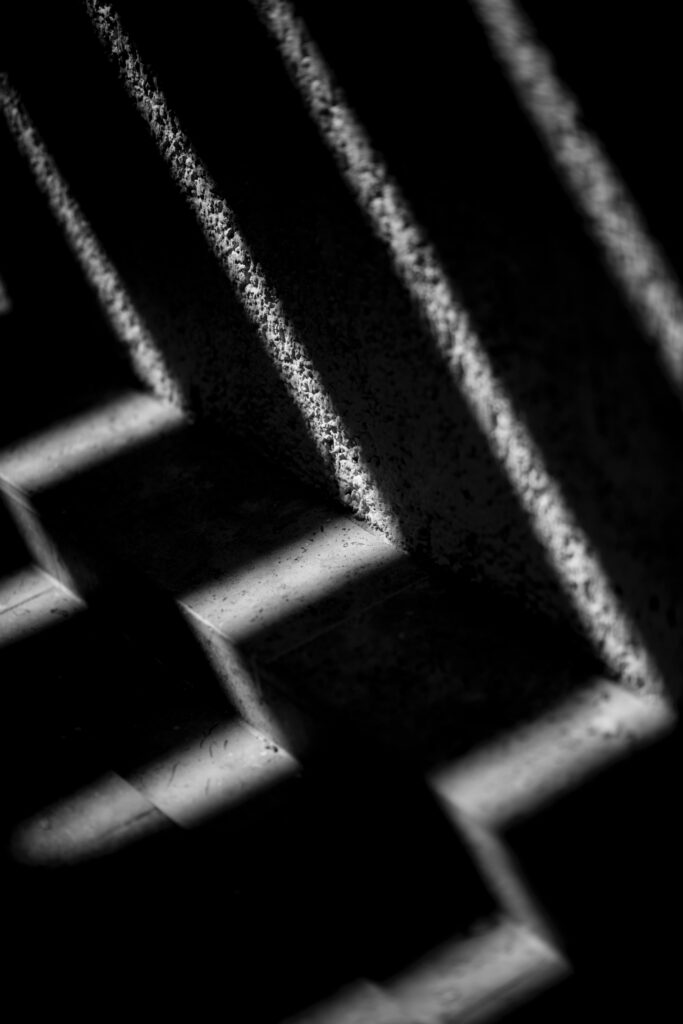 Striking Black and White Architectural Wallpaper with Geometric Design