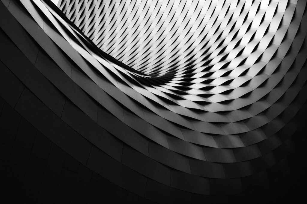 Striking Black and White Architectural Wallpaper with Fluid Design