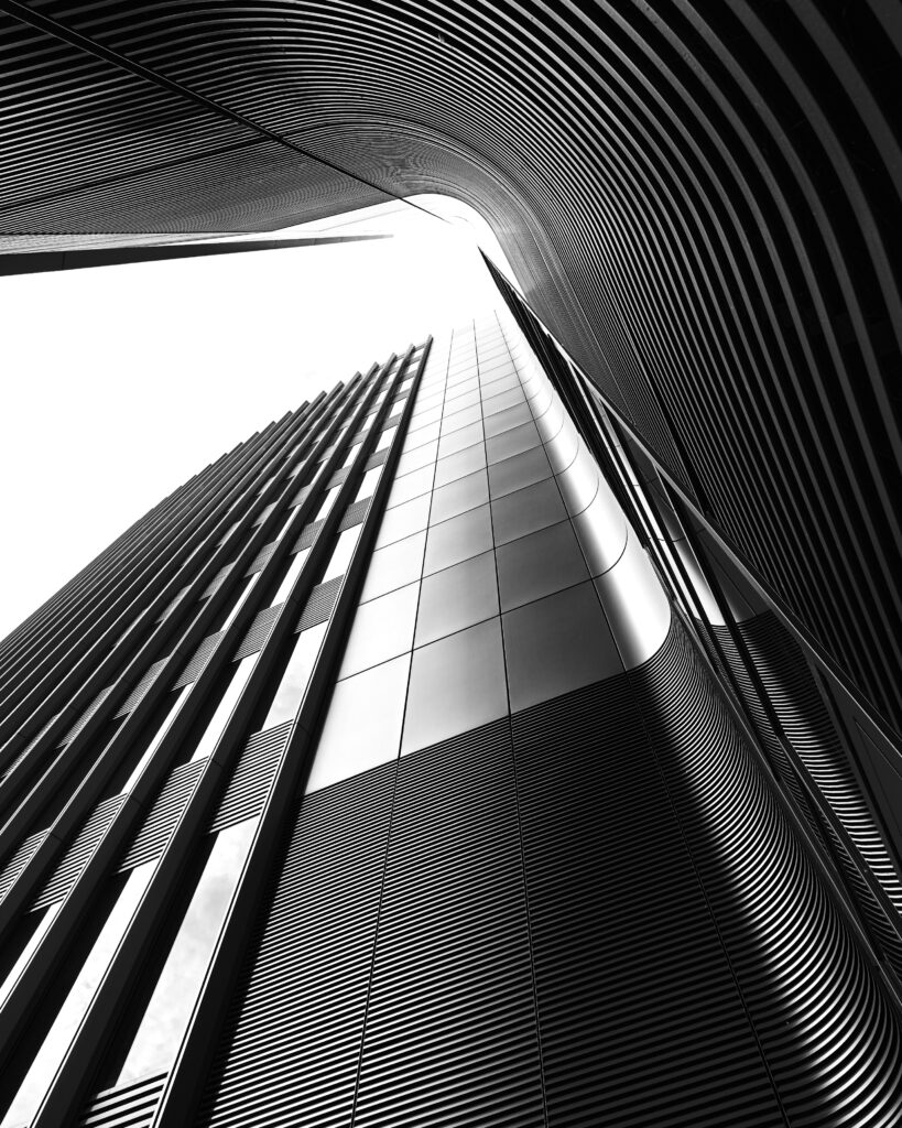 Bold Black and White Architectural Wallpaper with Elegant Curves
