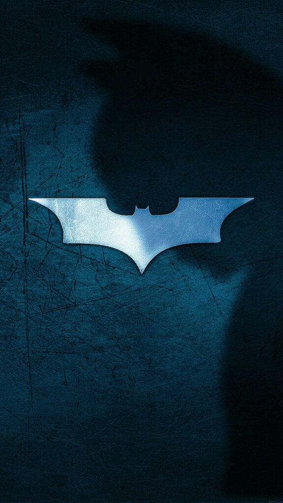 Blue Batman logo on dark textured background bold mysterious iPhone wallpaper for Batman fans