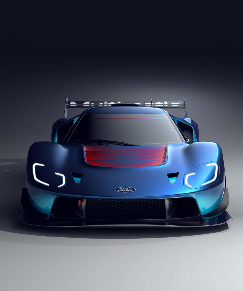 Front view of striking blue Ford GT race car with sleek design and aggressive headlights wallpaper