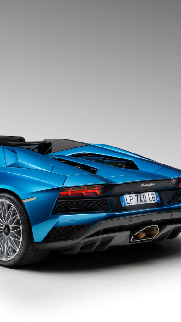 Blue Lamborghini Huracan rear profile studio shot showcasing sleek design and power wallpaper