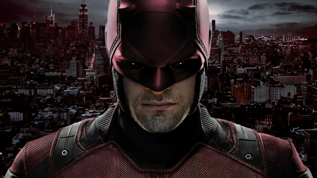 Vibrant Daredevil Wallpaper: Marvel Hero in Red Against Cityscape