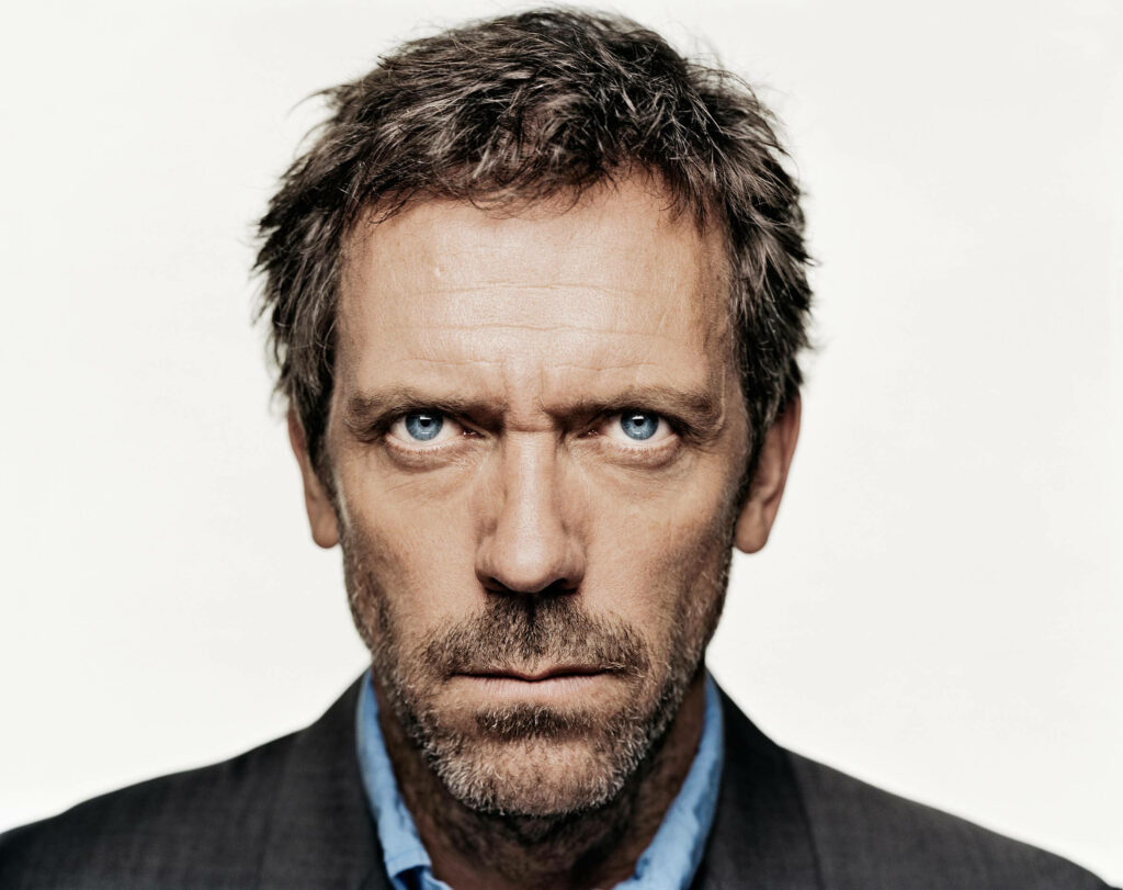 Intense Dr. Gregory House Wallpaper - Commanding Presence Background