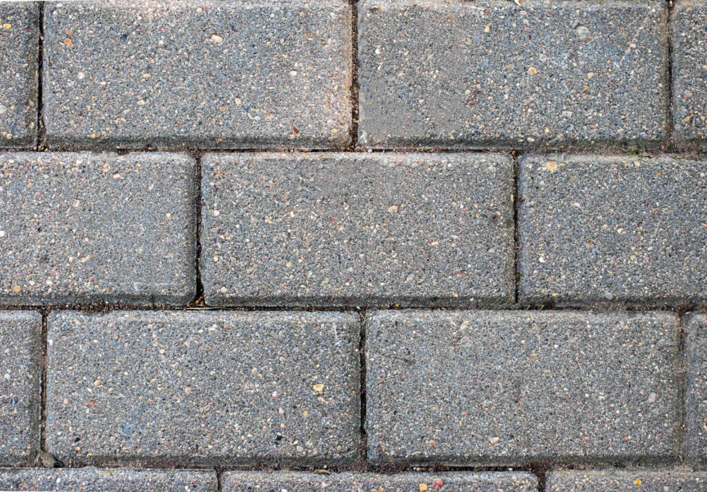 Stylish Gray Textured Wallpaper: Rugged Rectangular Stone Tile Design