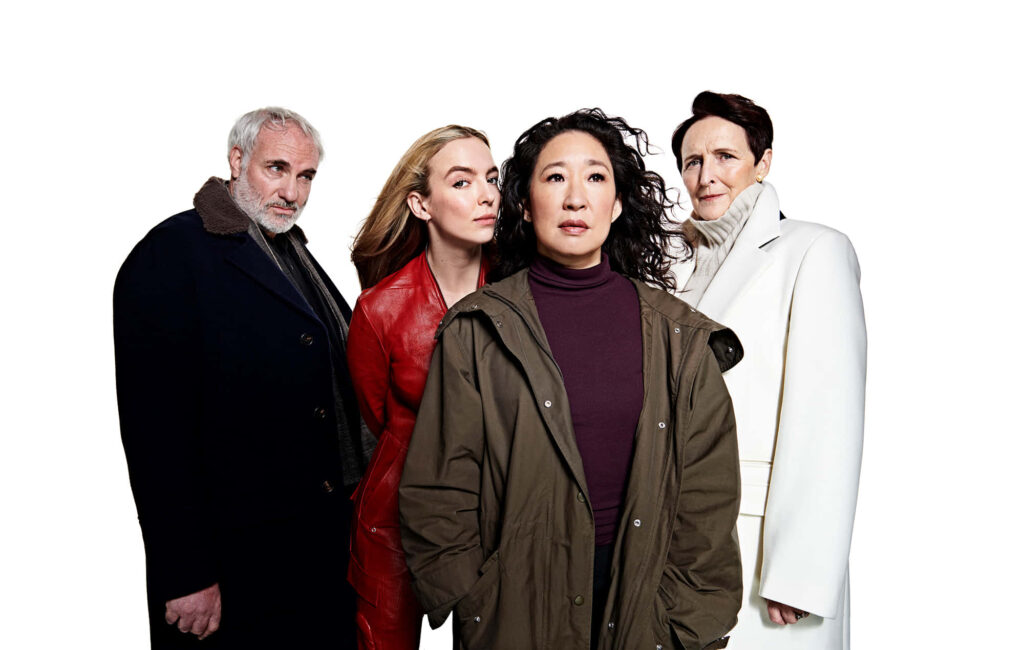 Dynamic Killing Eve Cast Portrait: Striking Wallpaper Background