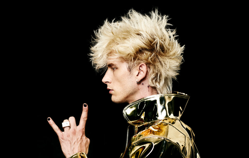 Machine Gun Kelly Profile Wallpaper: Platinum Hair & Bold Style
