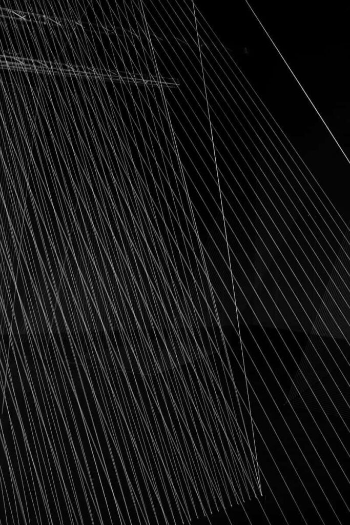 Modern Abstract Wallpaper: Crisp White Lines on Black Background