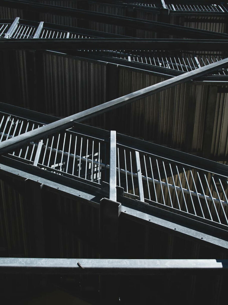 Monochrome Metal Structure Wallpaper: Modern Industrial Design