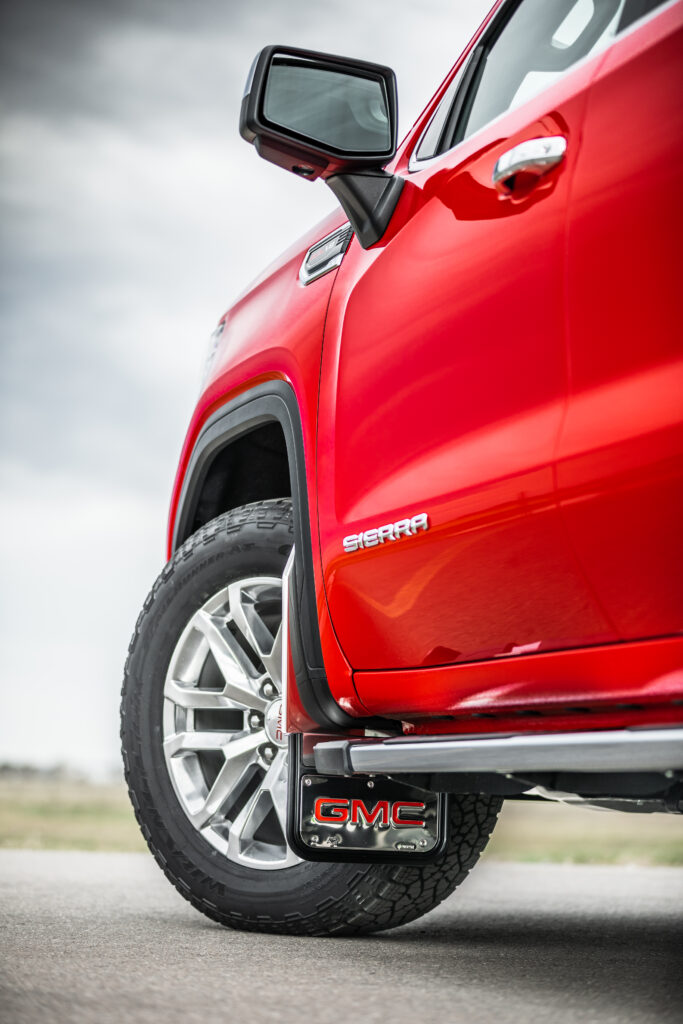Striking Red GMC Sierra Wallpaper - Bold Design & Sturdy Wheels