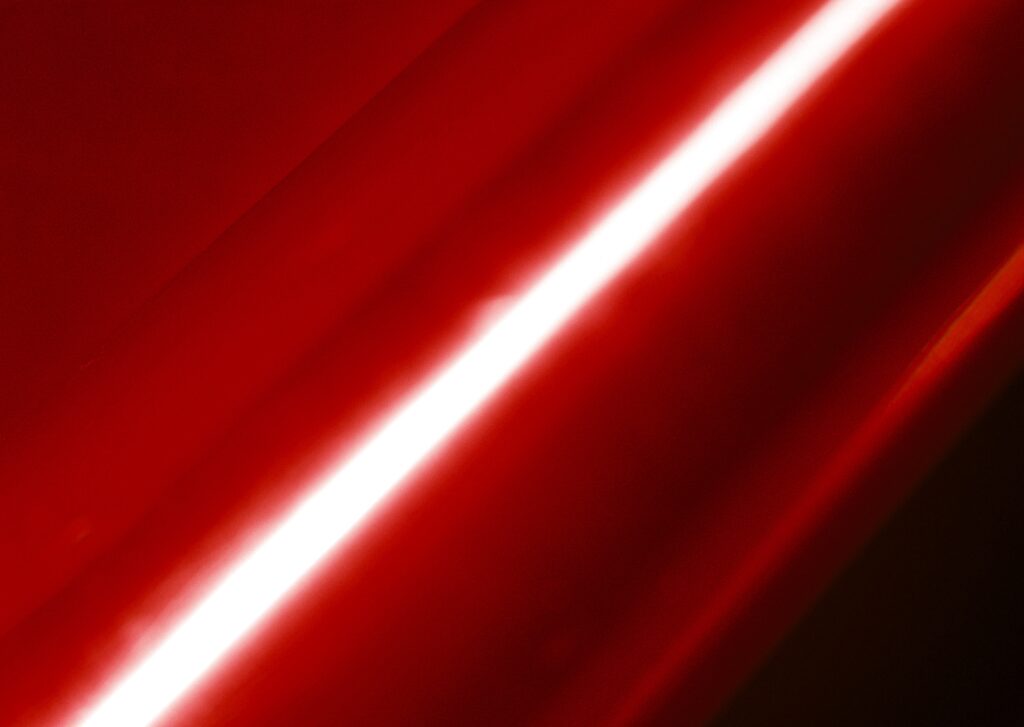 Vibrant Red Wallpaper with Shiny White Line - High-Res Background