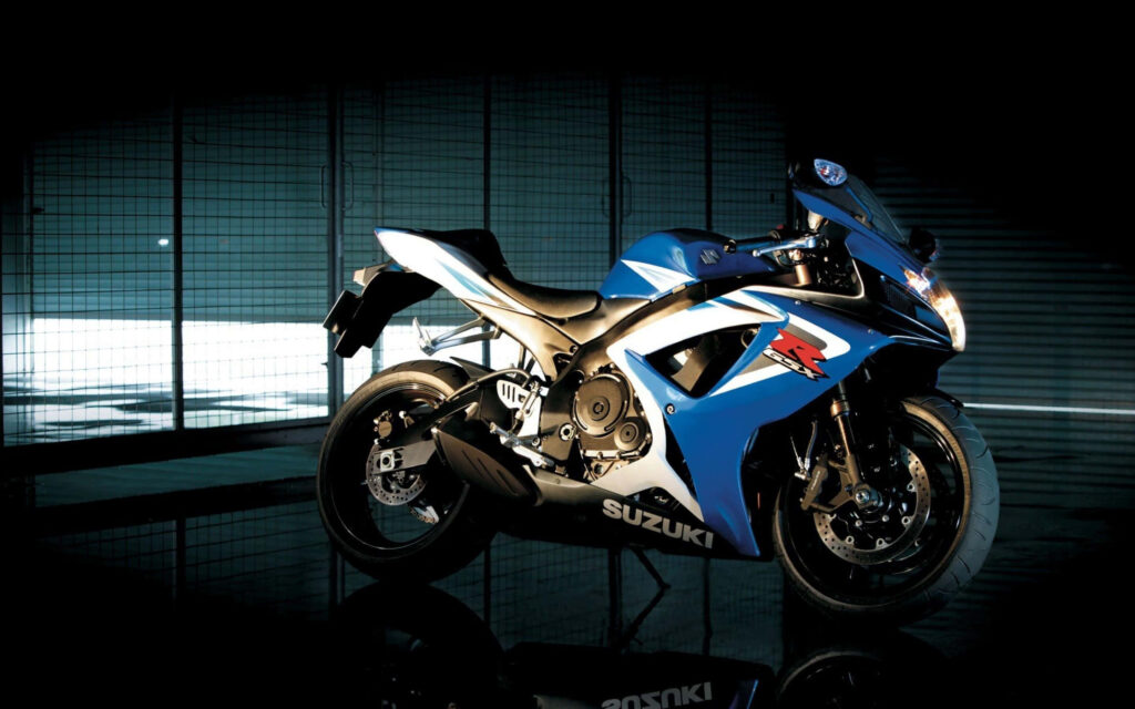 Sleek Blue & Black Suzuki Motorcycle Wallpaper - Adventure Awaits!