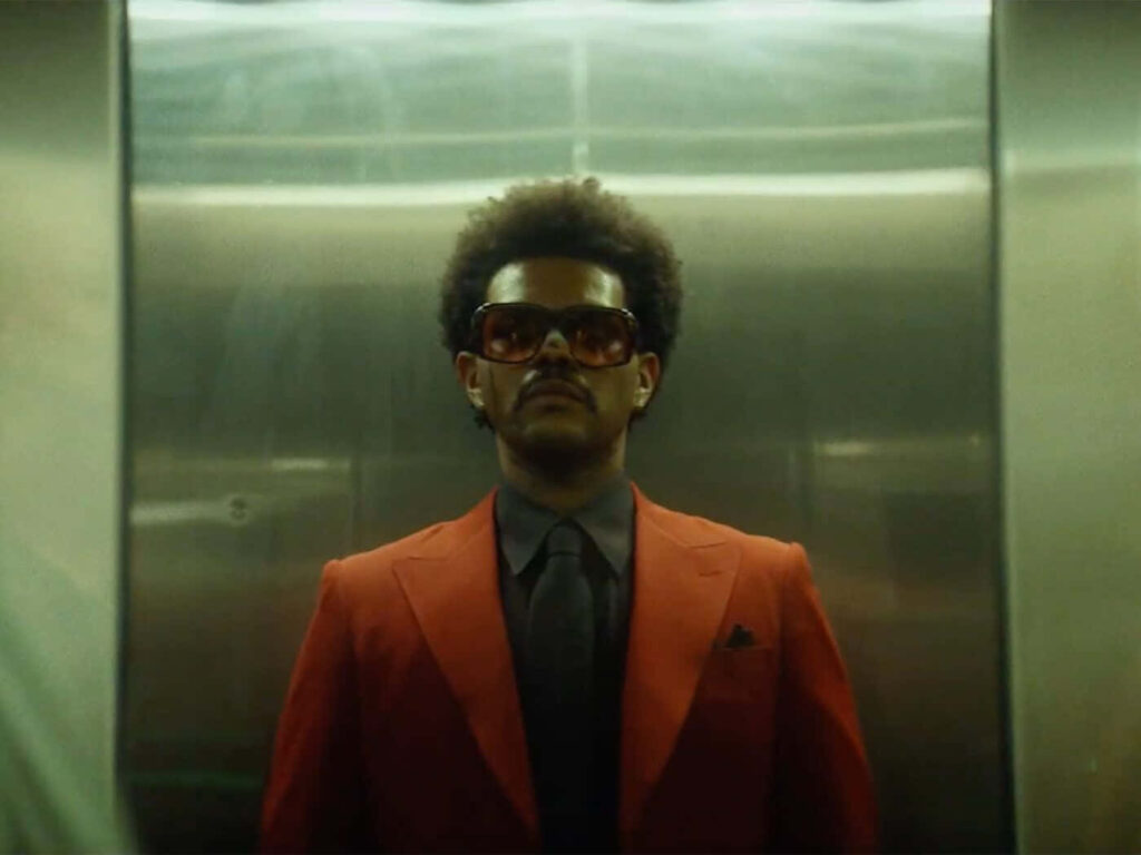 Vibrant The Weeknd After Hours Wallpaper: Intense Red Portrait
