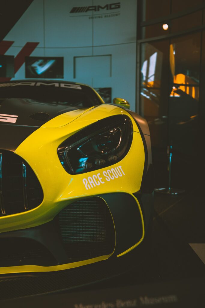 Dynamic Yellow Sports Car Wallpaper - Sleek Design & Bold Lines