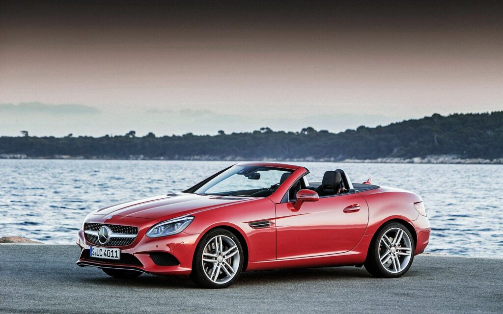 Elegant Red Mercedes-Benz SLK-Class R172 Wallpaper: Water & Trees
