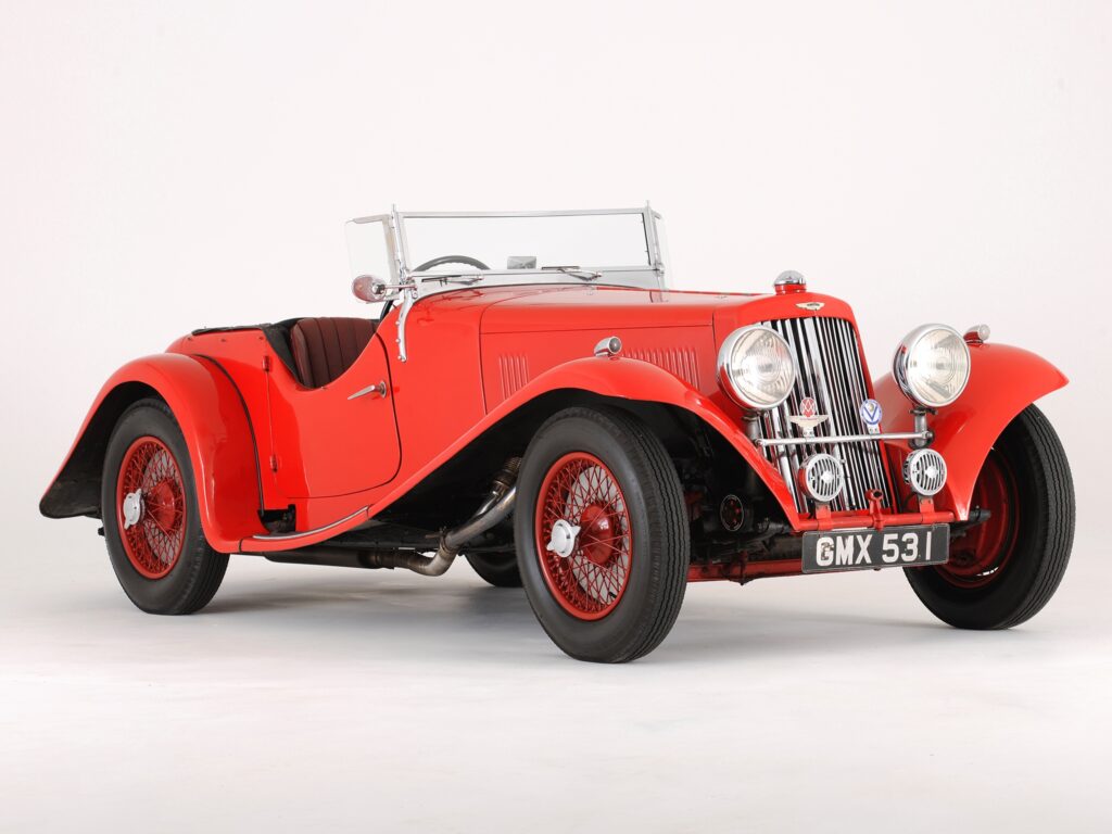 Stunning Red 1937 Aston Martin Wallpaper - Classic Retro Design