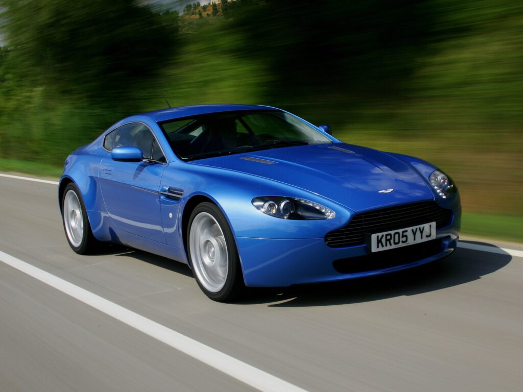 Stunning 2005 Aston Martin V8 Vantage Wallpaper in Vibrant Blue