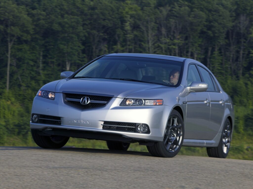 2007 Acura TL in Sleek Silver: Stylish Front View on Asphalt Road Wallpaper